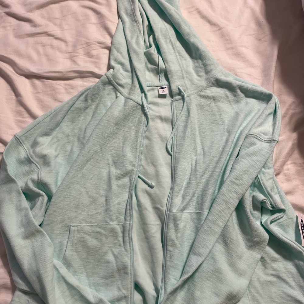 Women’s light blue zip up sweatshirt size XL brand new!